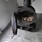 Calefacción central colgante interior decorativa de la chimenea alrededor de la estufa ardiente de madera